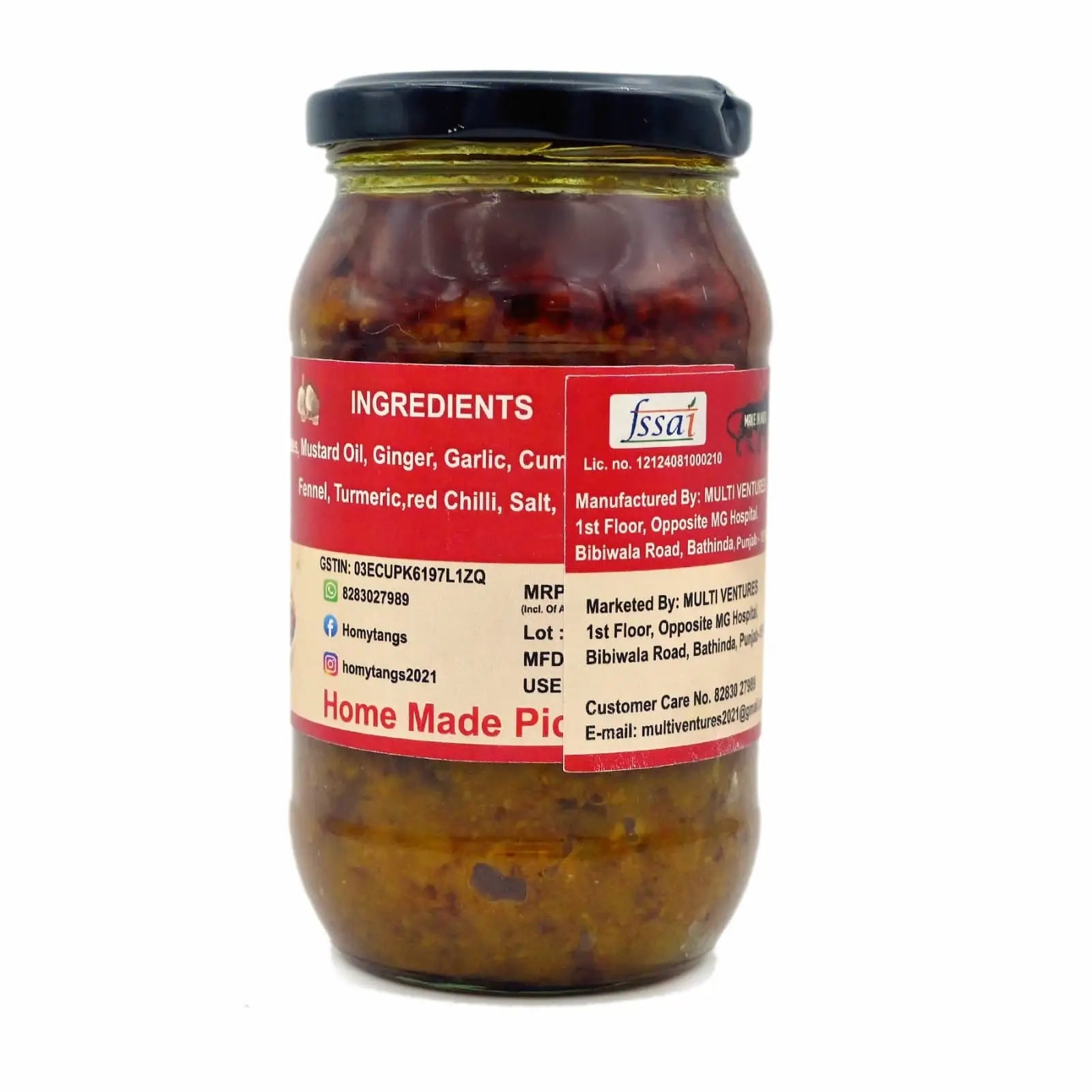 Homytangs Premium Khajoor Dates pickle jar showing golden-brown dates and spicy pickle texture in a 400g glass jar.